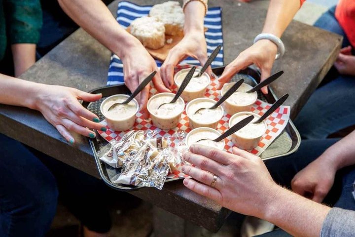 a person cutting food on a table