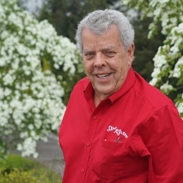 a man standing in a garden