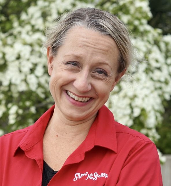 a person smiling for the camera