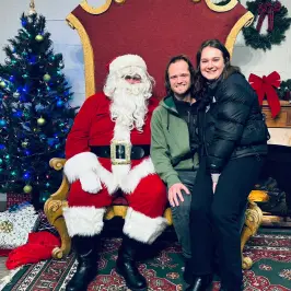 a group of people sitting posing for the camera