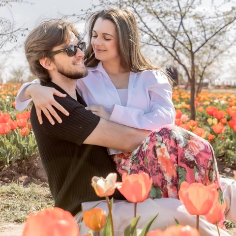 a woman sitting on a table